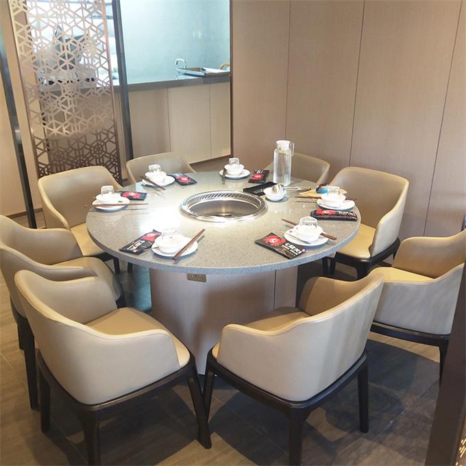 火（huǒ）鍋店（diàn）圓形大理石輕奢無（wú）煙（yān）淨化火鍋桌（zhuō）