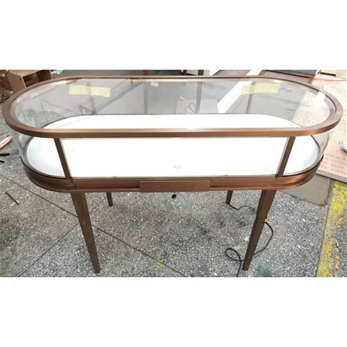 弧形卡地亞珠寶櫃台_不鏽鋼玻璃小珠（zhū）寶展示櫃